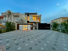 5,000 sq. ft. villa for sale in Al Muwaihat 1, Ajman—opposite a mosque; includes electricity, wate