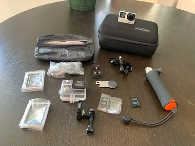GoPro HERO4 - Camera + Case & Accessories Bundle