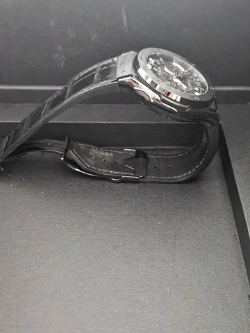 Men's automatic skeleton dial wristwatch with black leather strap