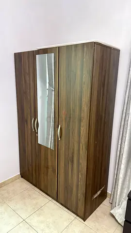 Dark wood wardrobe/cupboard and TV Table good condition, 2-door internal shelves