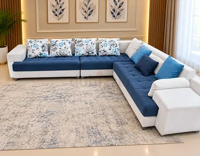 Large modern L-shaped fabric sofa with cushions - blue & white