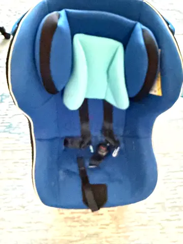 Blue infant car seat with head support - good condition