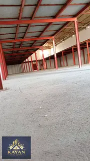 Warehouse for annual rent in Umm Al-Tha'oub, with an area of ​​6,000 square feet.