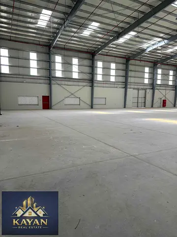 16,500 SQFT warehouse for rent in UAQ Old Industrial Area, first use, glass façade, main road.