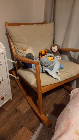 Solid Wooden rocking lounge chair with cushion — good condition
