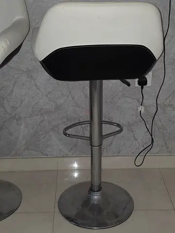 Set of 2 adjustable white and black bar stools with chrome base