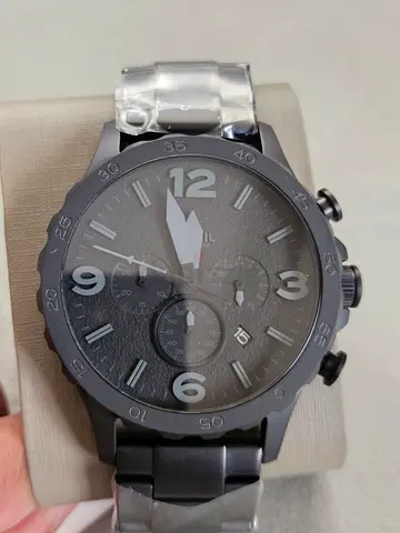 Black men's chronograph wristwatch with metal bracelet condition new with box
