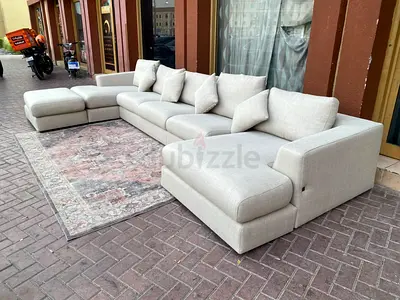 Available high quality marina home Usahpe sofa and with fostool Like new