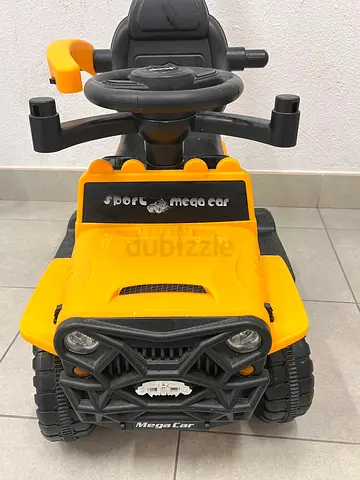 Yellow ride-on toy car for toddlers - good condition