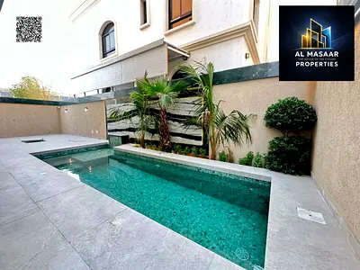 A luxurious villa including electricity, water, and central air conditioning, located directly oppo