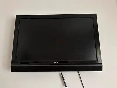 LG flat screen TV - 32 inch (used) with power cable