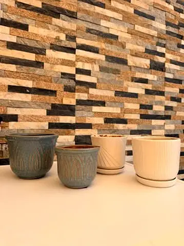 4 small plant pots for 20 AED