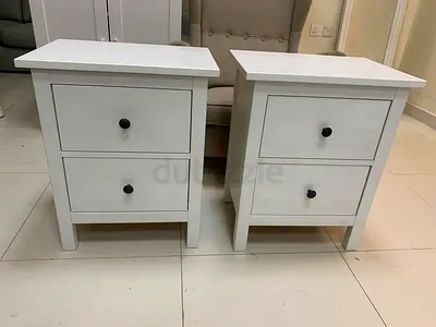Pair of white bedside tables with 2 drawers each