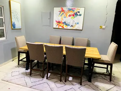 Solid Wood Dining Table with 8 Upholstered Chairs - Good Condition
