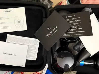 Theragun Elite massage gun with case and attachments - lightly used