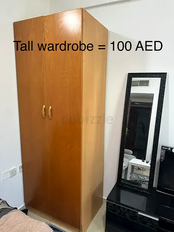Tall wooden wardrobe - good condition, 2-door, 100 AED