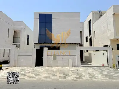 Own a luxury villa, registration fees included, opposite Al Hamidiya Park