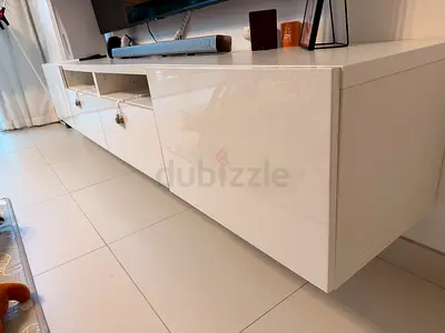 White high-gloss wall-mounted TV cabinet