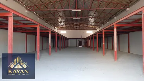 Warehouse for annual rent in Umm Al-Tha'oub, with an area of 6,000 square feet.