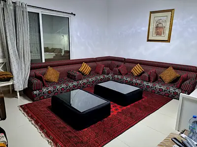 Large Traditional Arabic Majlis Seating with a big mat and two Tables