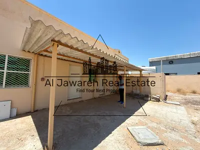 Warehouse with a walled yard, suitable for all types of activities and ready for immediate use – Umm Al-Tha'oub.