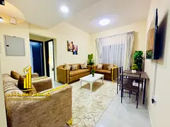 Luxury apartment (second occupancy), featuring a bedroom and a living room with an open balcony. in