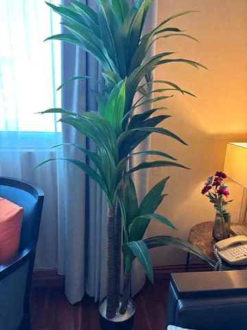 Tall artificial indoor plant in decorative pot - like new