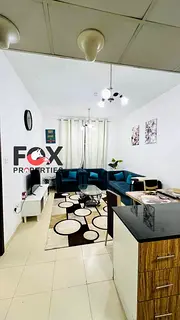 Furnished one-bedroom apartment with a living room for annual rent in City Tower; includes 2 bathroo
