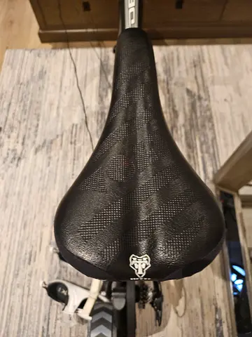 Used Volt bicycle saddle with seatpost clamp