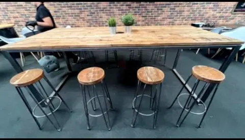 Industrial-style long wooden dining table with 4 matching bar stools - Size 250 mtr L x 1mt W
