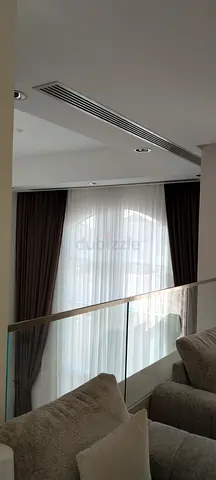 Floor-to-ceiling double-layer curtains (sheer + blackout) - like new