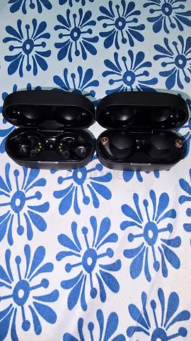 Sony WF-1000XM4 with extra charging case.