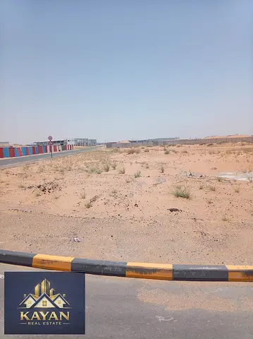 11,948 sq.ft investment land in UAQ, road access, ideal for warehouses & labour accommodation, 20 years.