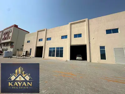15,000 sq. ft. warehouse for rent in UAQ, 100 kW power, 3 doors, modern Civil Defense.