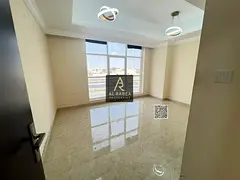 Spacious 3BR Apartment with Parking | Near Kanz Mall, Al Rawda