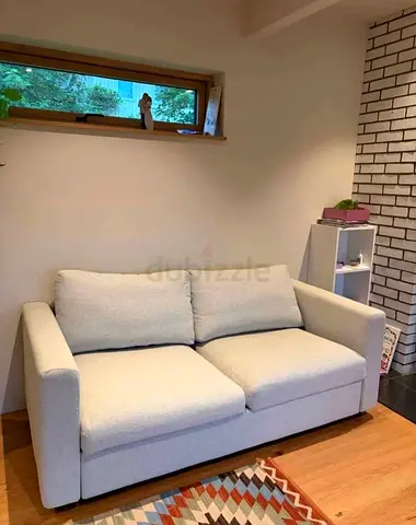 Light beige 2-seater sofa bed and comfortable vimle