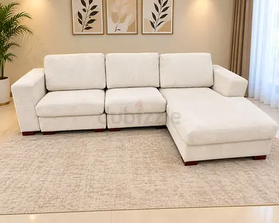 Light beige L-shaped sectional sofa with chaise - good condition