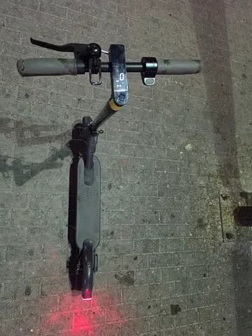 Used electric scooter — compact commuter scooter with rear light