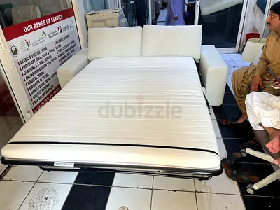White fabric sofa bed -fold-out sleeper in good condition vimle