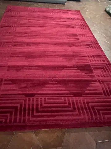 Maroon geometric area rug - good condition