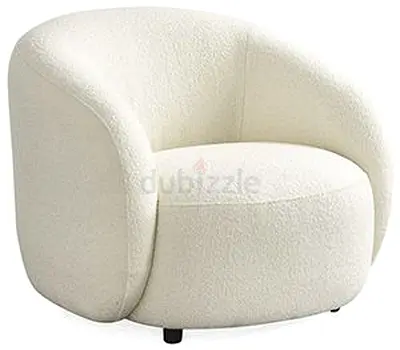 Cream boucle swivel lounge chair — cozy modern