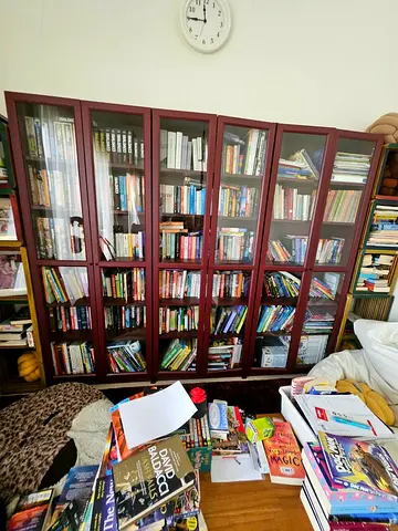 3 book cases with glass doors