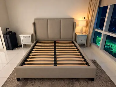 King fabric bed frame with padded headboard — beige, good condition