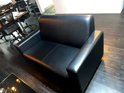 Black 2-Seater Leather Sofa in Good Condition