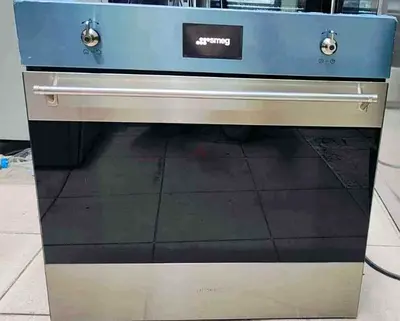 Smeg Built-in stainless steel electric oven 60cm