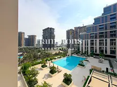 Bright & Spacious | Serene Park & Pool Outlook