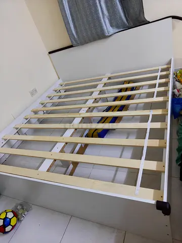 White wooden double bed frame with slats - good condition