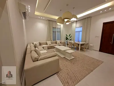 A luxury villa in Al Muwaihat 2, featuring five rooms. The price includes furniture, utilities (electricity and water), and air conditioning. The prop