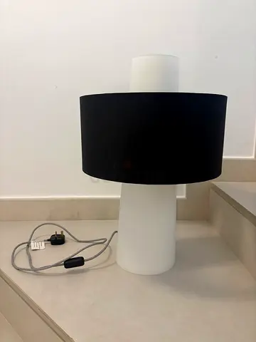 Modern white glass table lamp with black shade