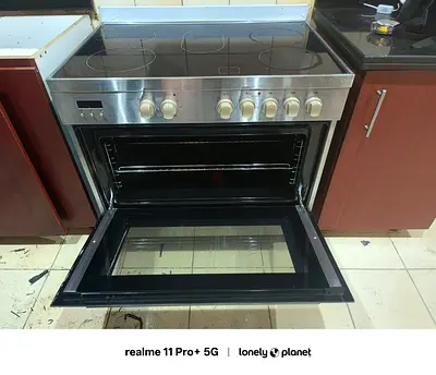 Stainless steel electric range with ceramic hob and oven